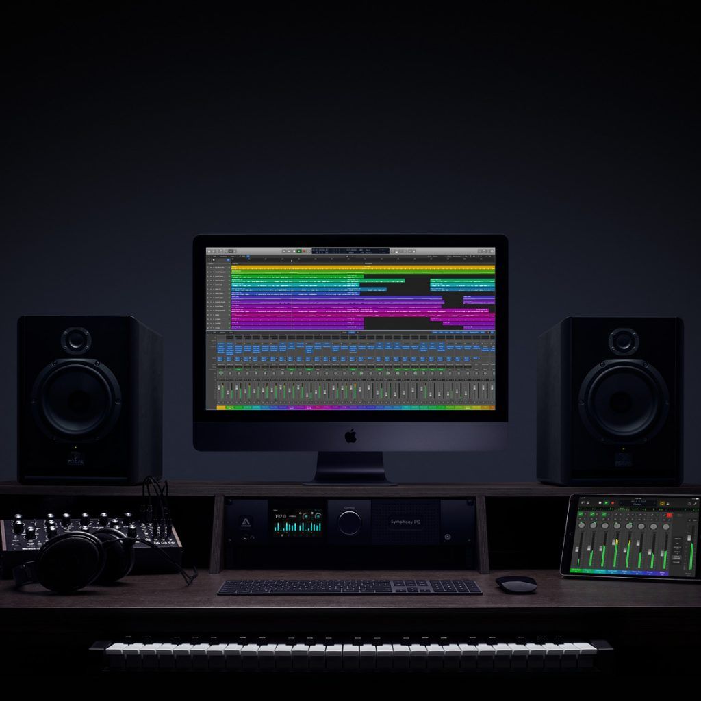 Logic website image. Photo of studio desk with logic pro on screen. 
